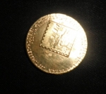 Zlatá minca -medaila-pošt.známka